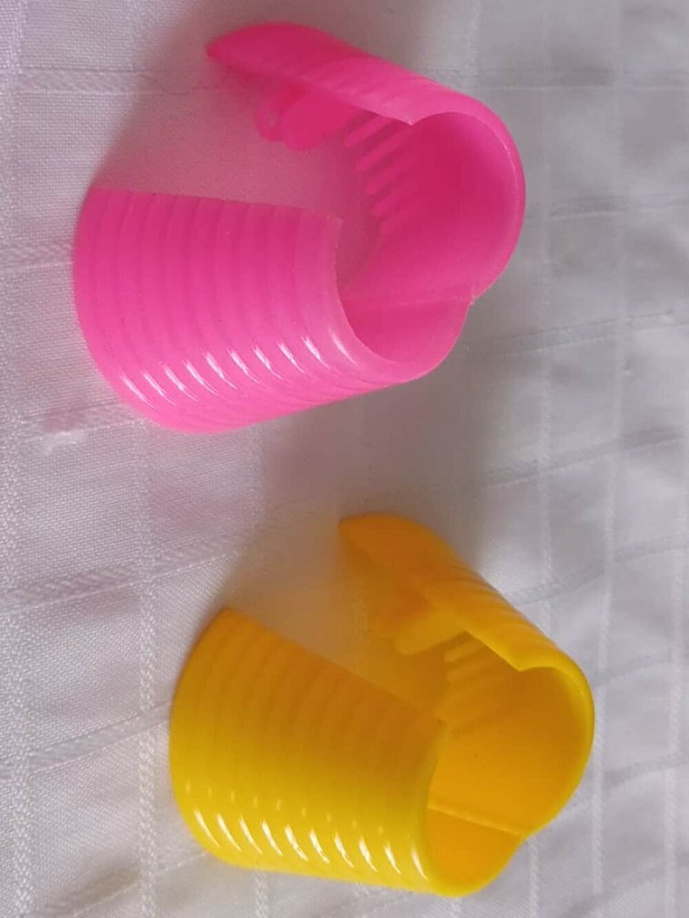 Two (2) vintage ponytail plastic hairclips